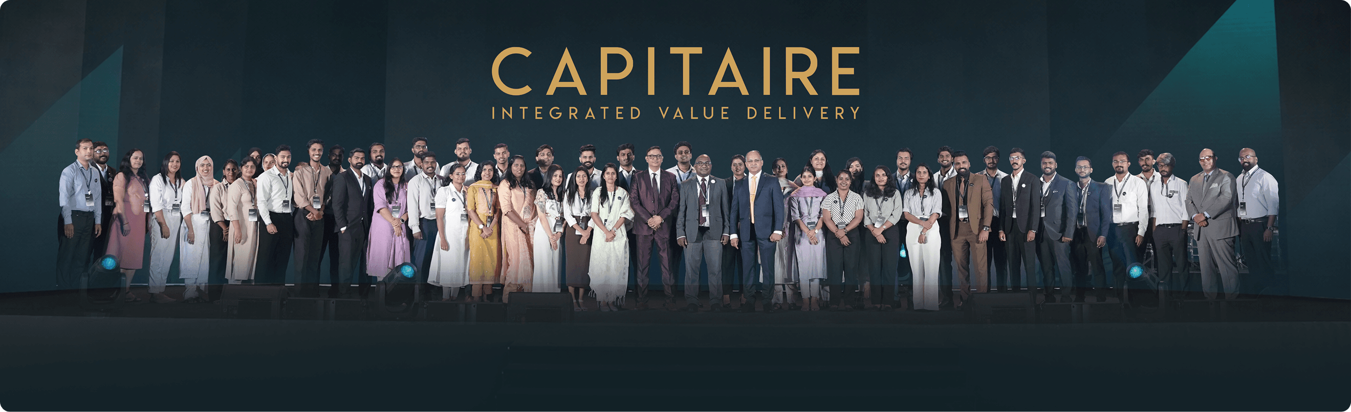 The CAPITAIRE team standing together on stage